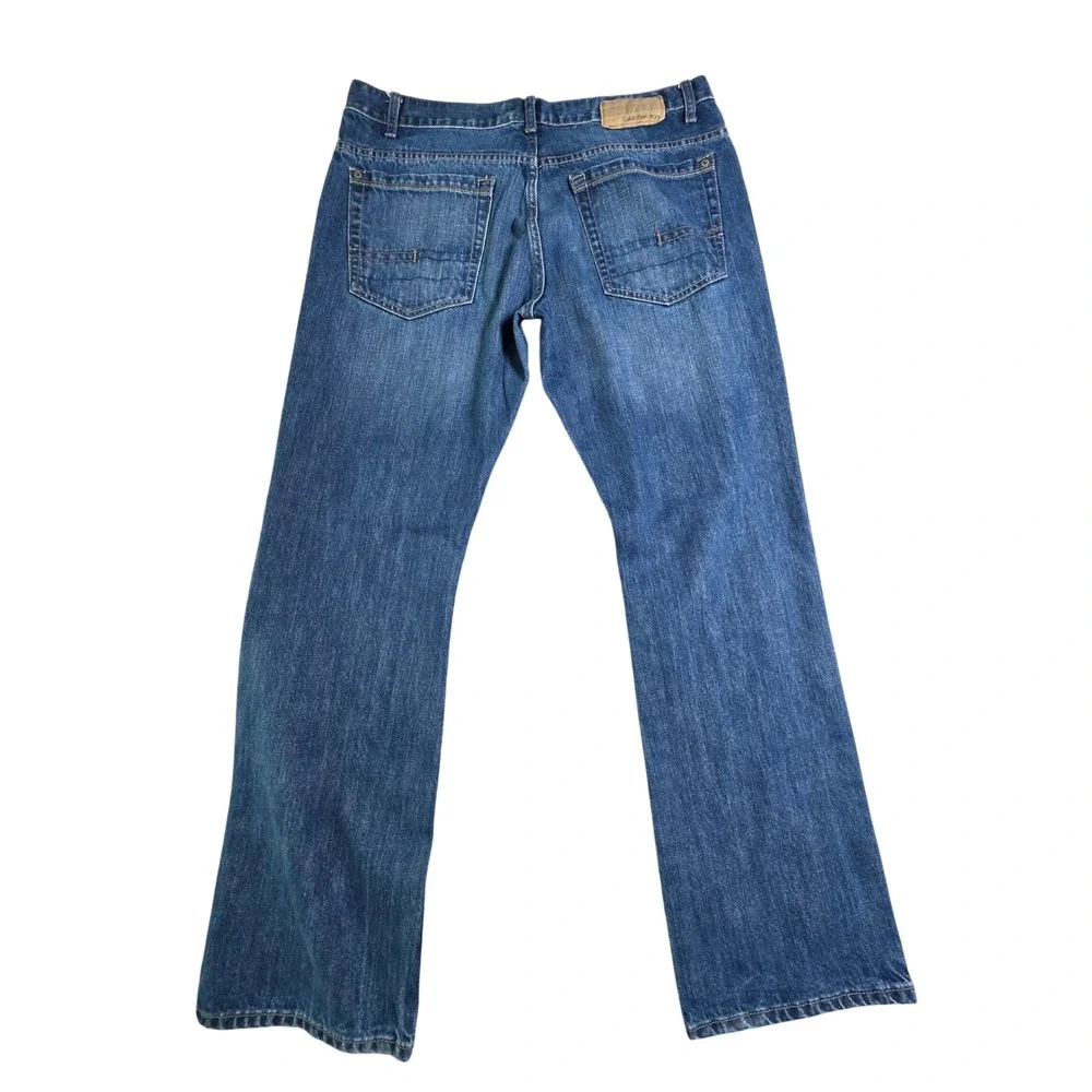 Calvin Klein Jeans Mens 34 Bootcut Medium Wash Blue Denim Pants 0984